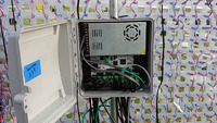 Falcon F16 controller in weatherproof enclosure mounted on the snowman frame